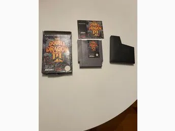 Double Dragon III: The Sacred Stones (NES)Swisha gärna som betalningssätt
