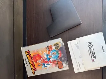 The Goonies II fodral + manual (NES)